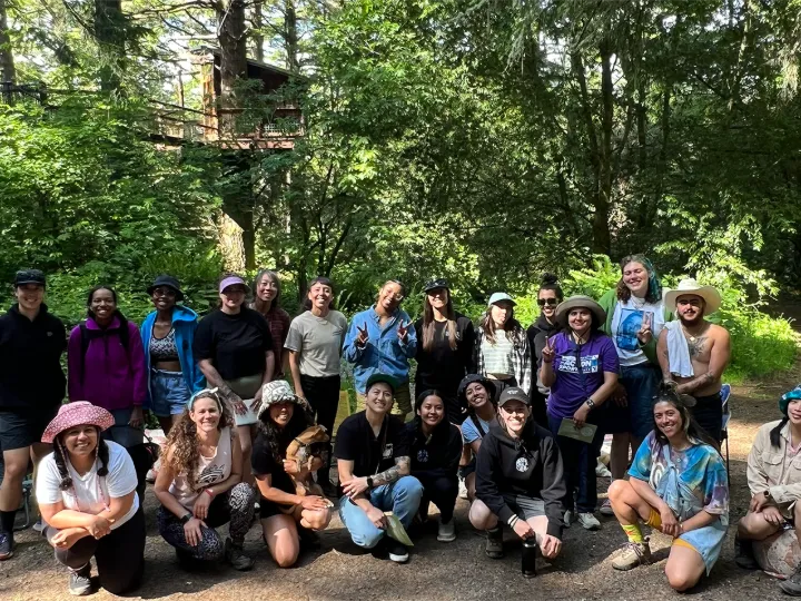 Group mindfulness hike in the forest